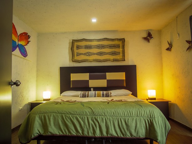 Imagen de la habitación del Hotel Villas Mariposas. Foto 11