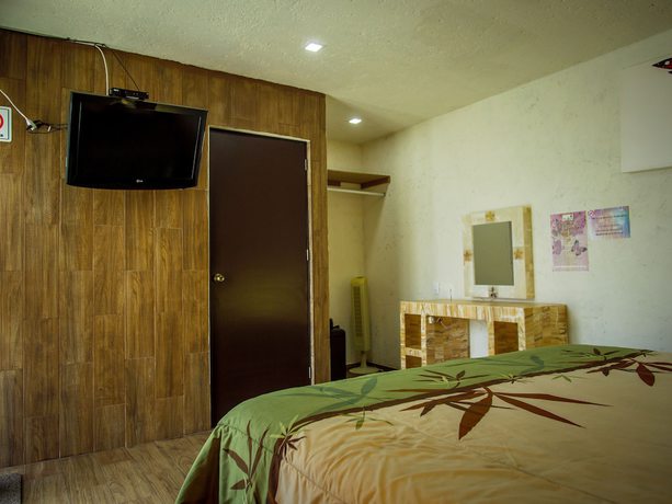 Imagen de la habitación del Hotel Villas Mariposas. Foto 12