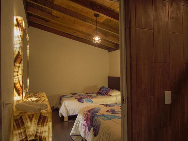 Imagen de la habitación del Hotel Villas Mariposas. Foto 15