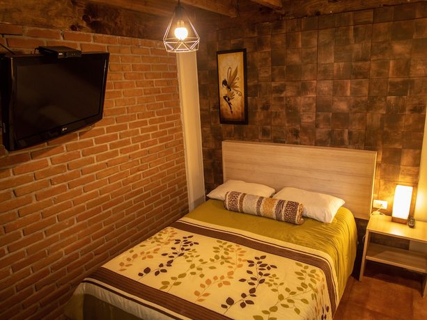 Imagen de la habitación del Hotel Villas Mariposas. Foto 16