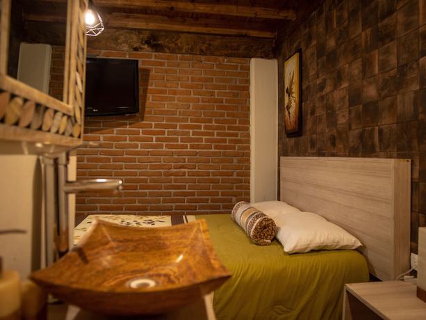 Imagen de la habitación del Hotel Villas Mariposas. Foto 18
