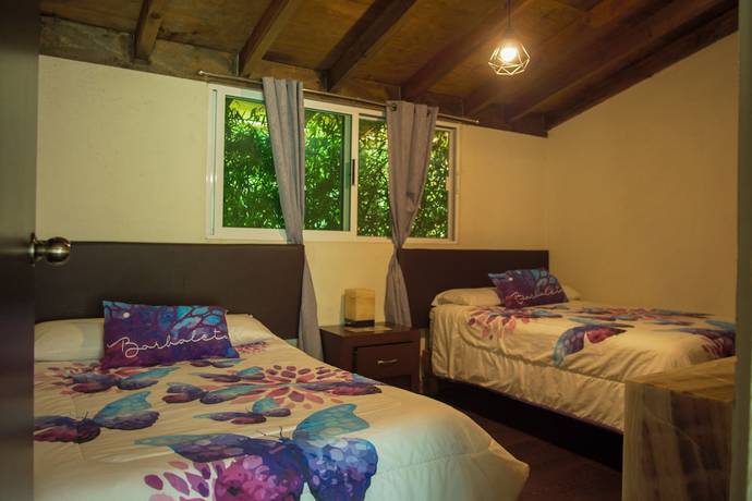 Imagen de la habitación del Hotel Villas Mariposas. Foto 19