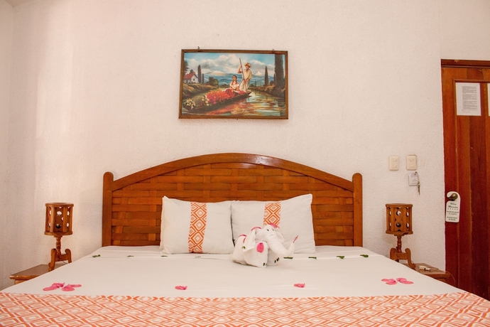 Imagen de la habitación del Hotel Villas Mercedes. Foto 10