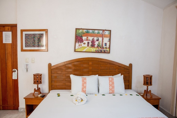 Imagen de la habitación del Hotel Villas Mercedes. Foto 11