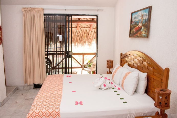Imagen de la habitación del Hotel Villas Mercedes. Foto 12