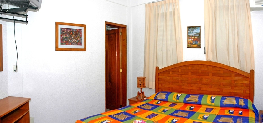 Imagen de la habitación del Hotel Villas Mercedes. Foto 13