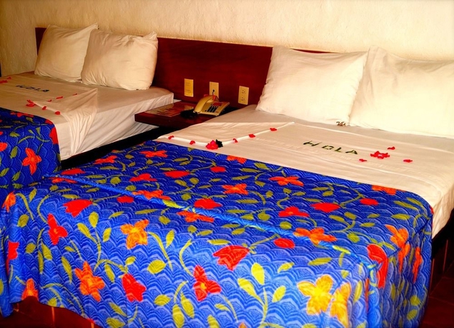 Imagen de la habitación del Hotel Villas Miramar. Foto 4