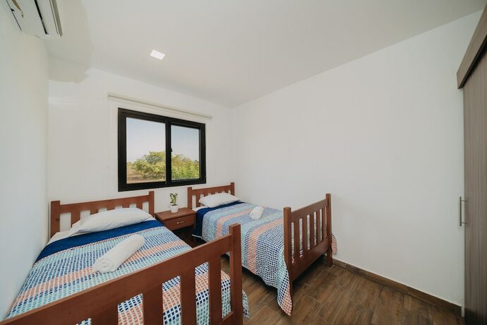 Imagen de la habitación del Hotel Villas Oazis. Foto 17