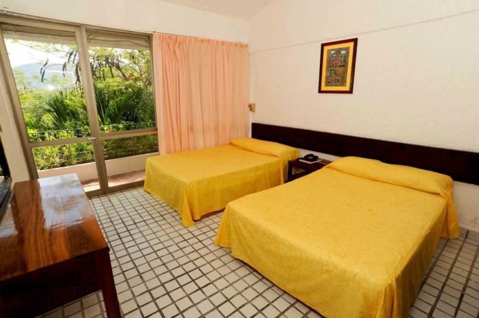 Imagen de la habitación del Hotel Villas Para&iacute;so. Foto 7