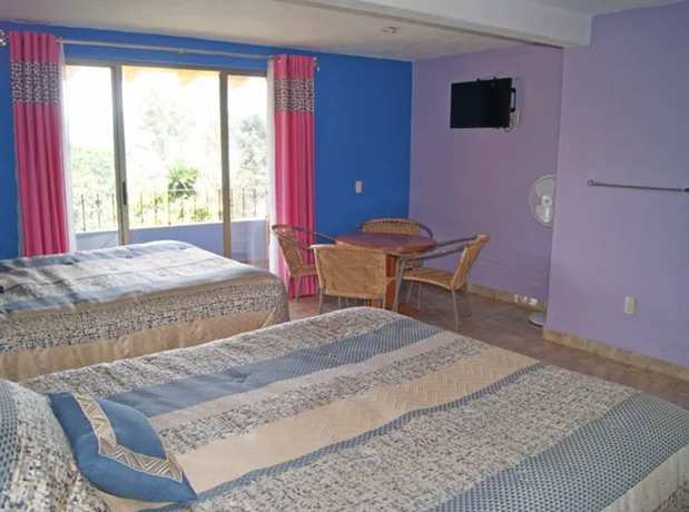 Imagen de la habitación del Hotel Villas Paraiso. Foto 18