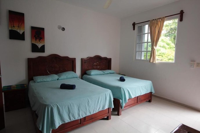Imagen de la habitación del Hotel Villas Roseliz Punta Allen. Foto 7