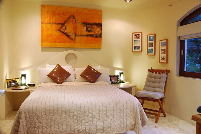 Imagen de la habitación del Hotel Villas Sacbe Condo and Beach Club. Foto 2