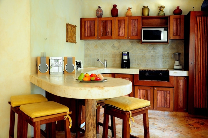 Imagen de la habitación del Hotel Villas Sacbe Condo and Beach Club. Foto 4