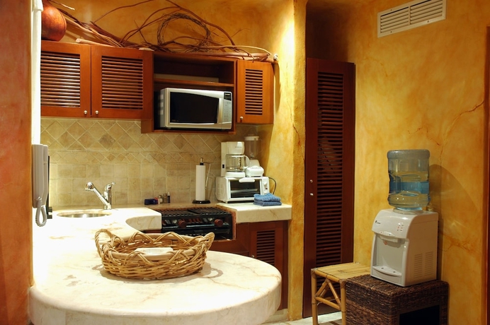 Imagen de la habitación del Hotel Villas Sacbe Condo and Beach Club. Foto 10