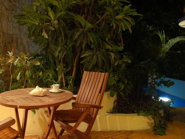 Imagen de la habitación del Hotel Villas Sacbe Condo and Beach Club. Foto 16