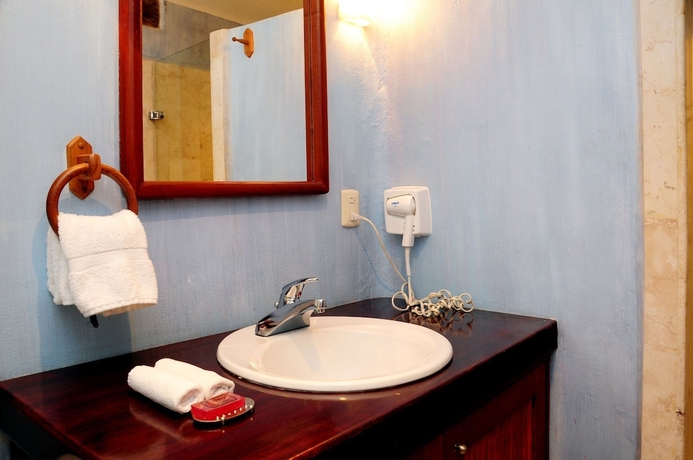 Imagen de la habitación del Hotel Villas Sacbe Condo and Beach Club. Foto 19