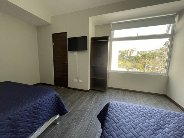 Imagen de la habitación del Hotel Villas Santander - Deluxe Stay. Foto 16