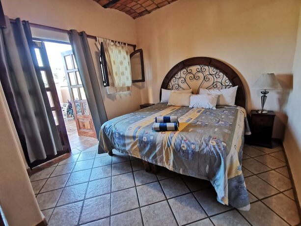 Imagen de la habitación del Hotel Villas Vista Suites. Foto 16