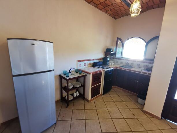 Imagen de la habitación del Hotel Villas Vista Suites. Foto 18