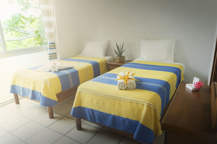 Imagen de la habitación del Hotel Villas and Resort Luz De Luna. Foto 4