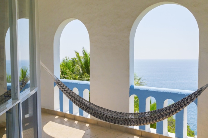 Imagen de la habitación del Hotel Villas and Resort Luz De Luna. Foto 6