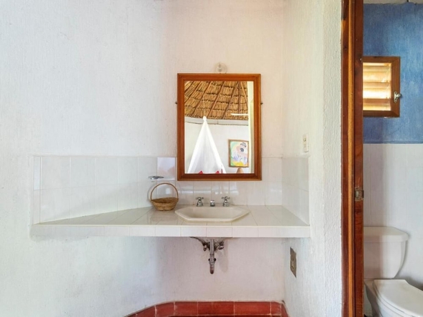Imagen de la habitación del Hotel Villas del Angel. Foto 13