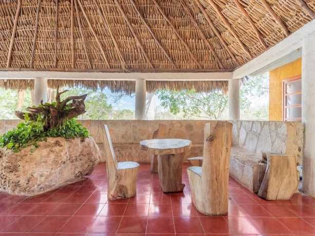 Imagen de la habitación del Hotel Villas del Angel. Foto 16