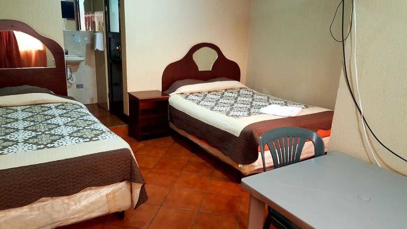 Imagen de la habitación del Hotel Villas del mirador. Foto 16