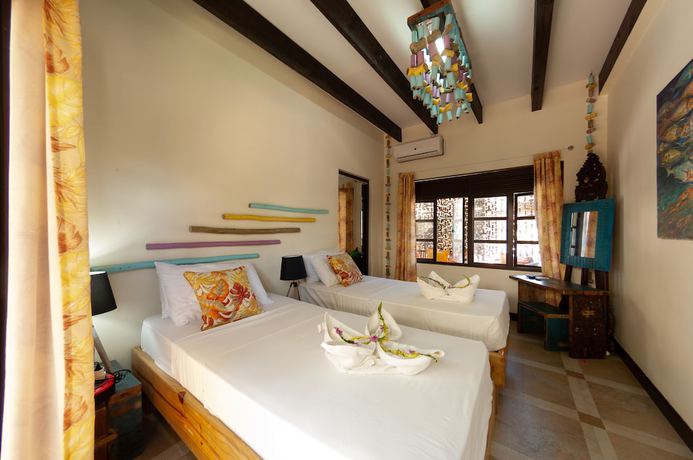 Imagen de la habitación del Hotel Villas des Alizes. Foto 18