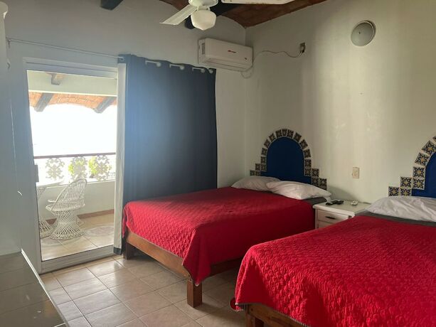 Imagen de la habitación del Hotel Villas el Dorado. Foto 11