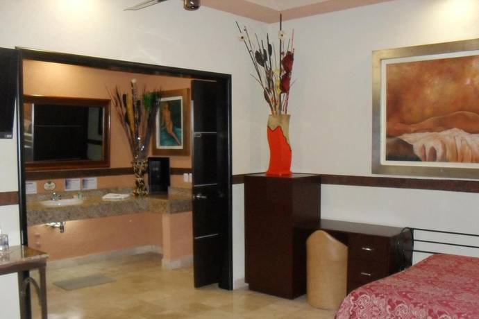 Imagen de la habitación del Hotel Villas y Suites Paraiso del Sur. Foto 19
