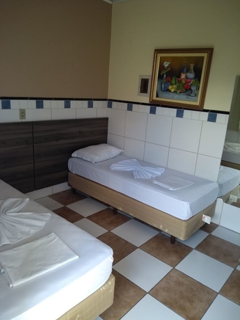 Imagen de la habitación del Hotel Ville House Canoas. Foto 10