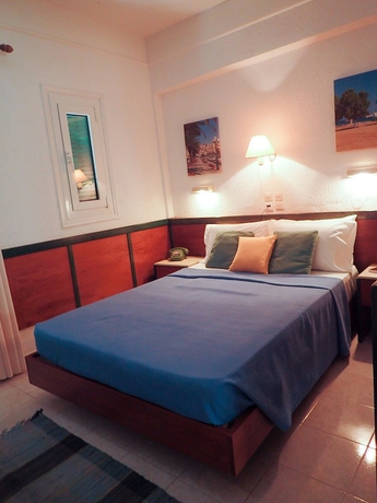 Imagen de la habitación del Hotel Villea Village. Foto 8