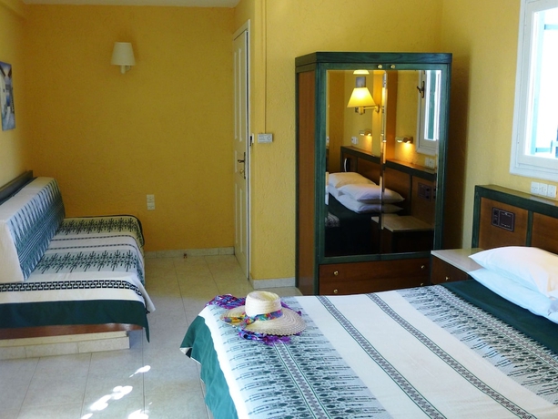 Imagen de la habitación del Hotel Villea Village. Foto 9