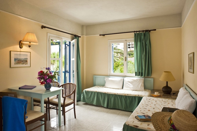 Imagen de la habitación del Hotel Villea Village. Foto 11