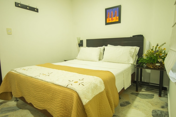 Imagen de la habitación del Hotel Villeta Suite. Foto 8