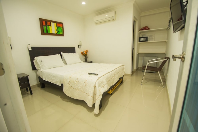 Imagen de la habitación del Hotel Villeta Suite. Foto 10