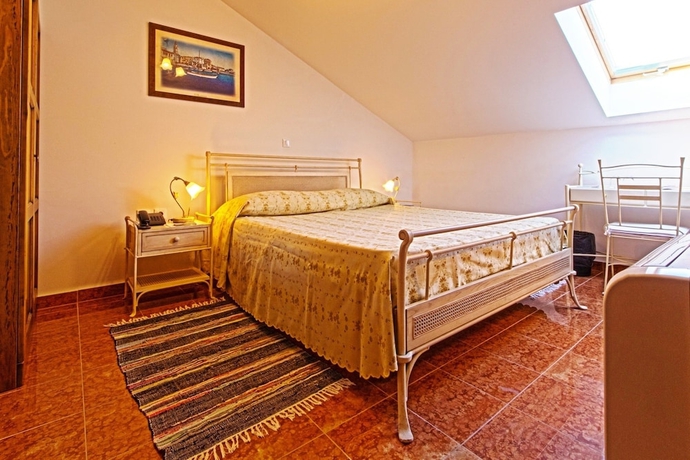 Imagen de la habitación del Hotel Villetta Phasiana. Foto 6