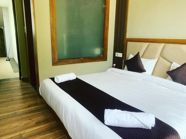 Imagen de la habitación del Hotel Vimal Ganga. Foto 14