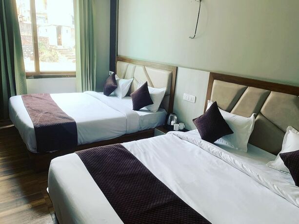 Imagen de la habitación del Hotel Vimal Ganga. Foto 15