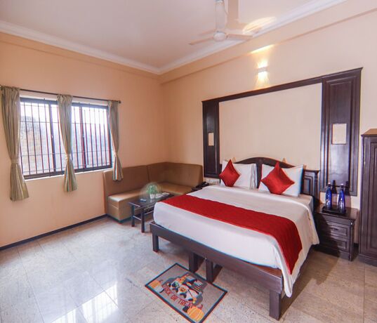 Imagen de la habitación del Hotel Vinayaga Excellenciy Tiruppur. Foto 13