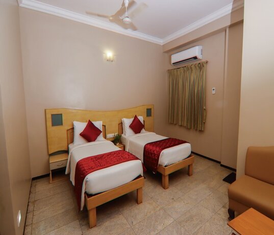 Imagen de la habitación del Hotel Vinayaga Excellenciy Tiruppur. Foto 15