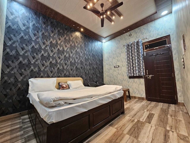 Imagen de la habitación del Hotel Vinayak Guest House. Foto 7