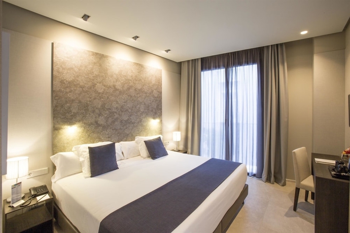 Imagen de la habitación del Hotel Vincci Mercat. Foto 3
