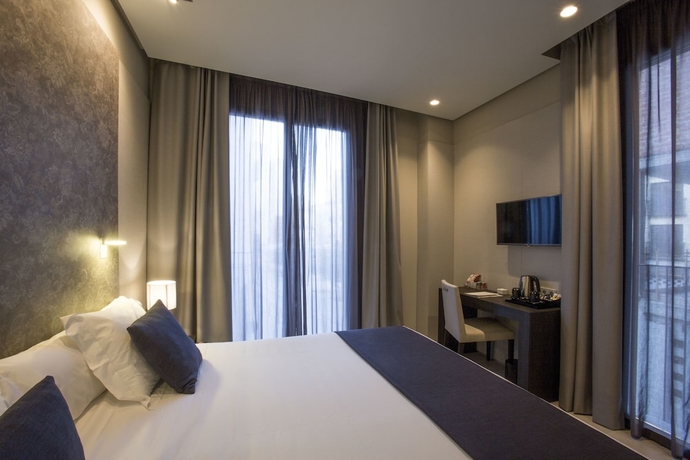 Imagen de la habitación del Hotel Vincci Mercat. Foto 11