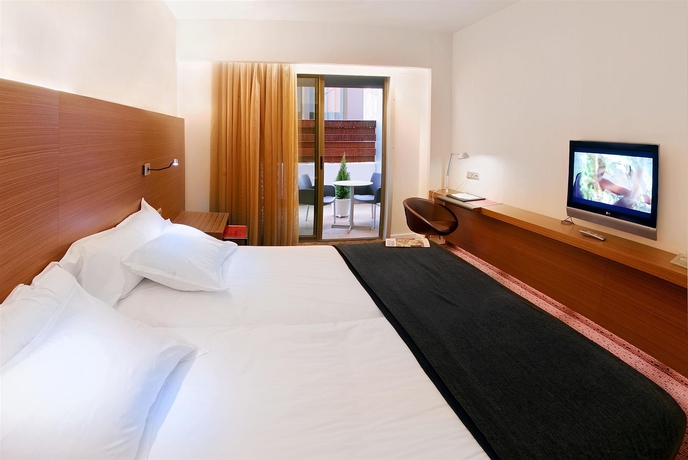 Imagen de la habitación del Hotel Vincci Zentro Zaragoza. Foto 5