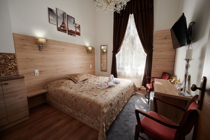 Imagen de la habitación del Hotel Vinci Apartman Szombathely. Foto 4