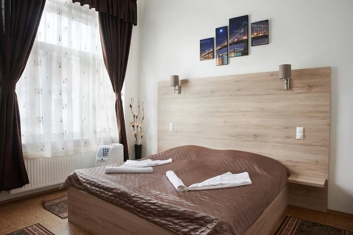 Imagen de la habitación del Hotel Vinci Apartman Szombathely. Foto 15
