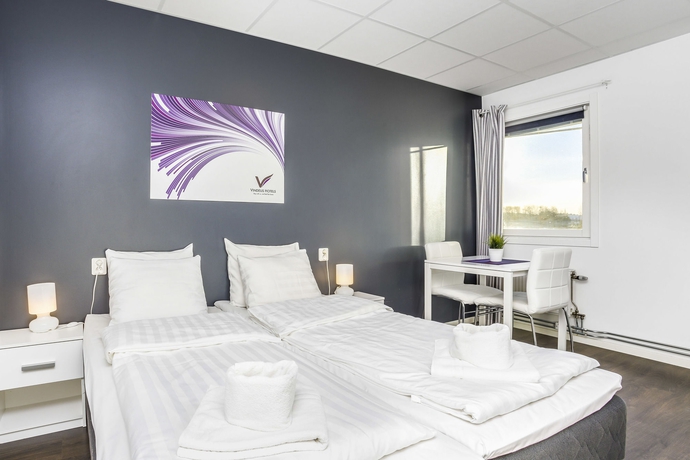 Imagen de la habitación del Hotel Vindeus. Foto 12