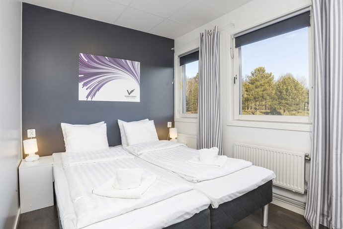 Imagen de la habitación del Hotel Vindeus. Foto 16